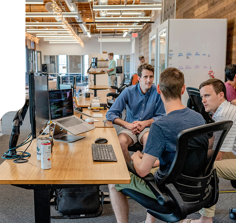 coworkers chatting in office