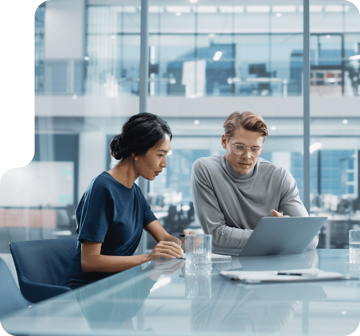 two business people sitting at a meeting