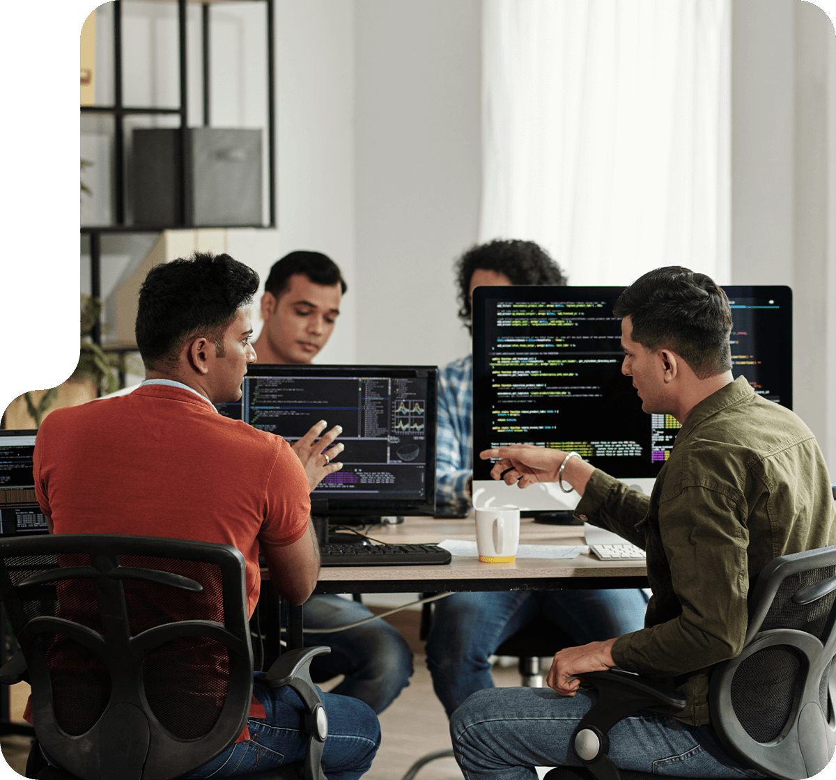 developers talking at their desks