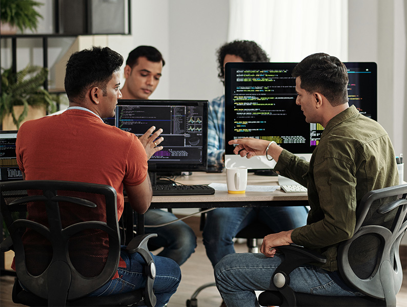 developers talking while working on a code